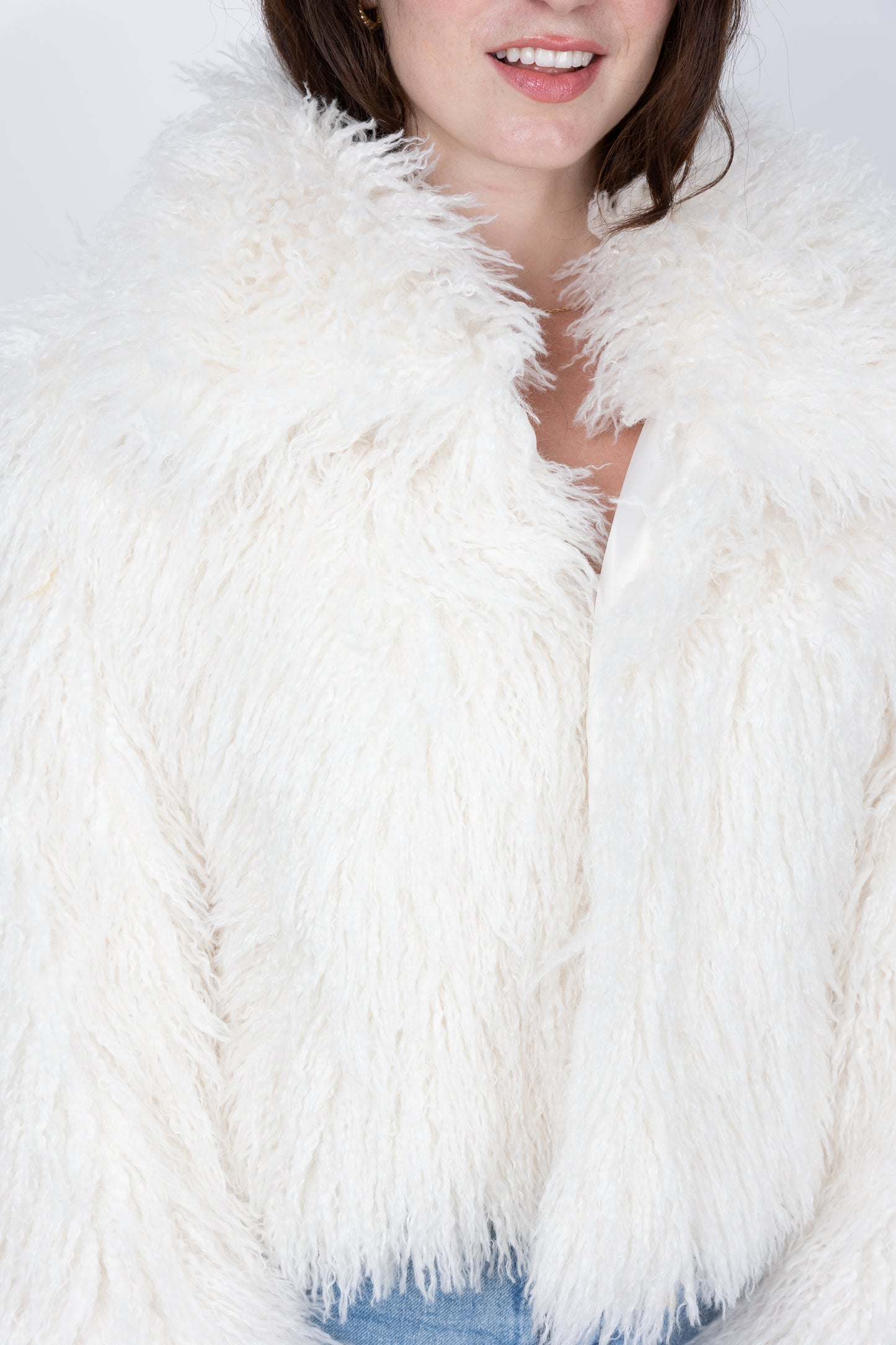 MANTEAU COURT EN FAUSSE FOURRURE MOUTON