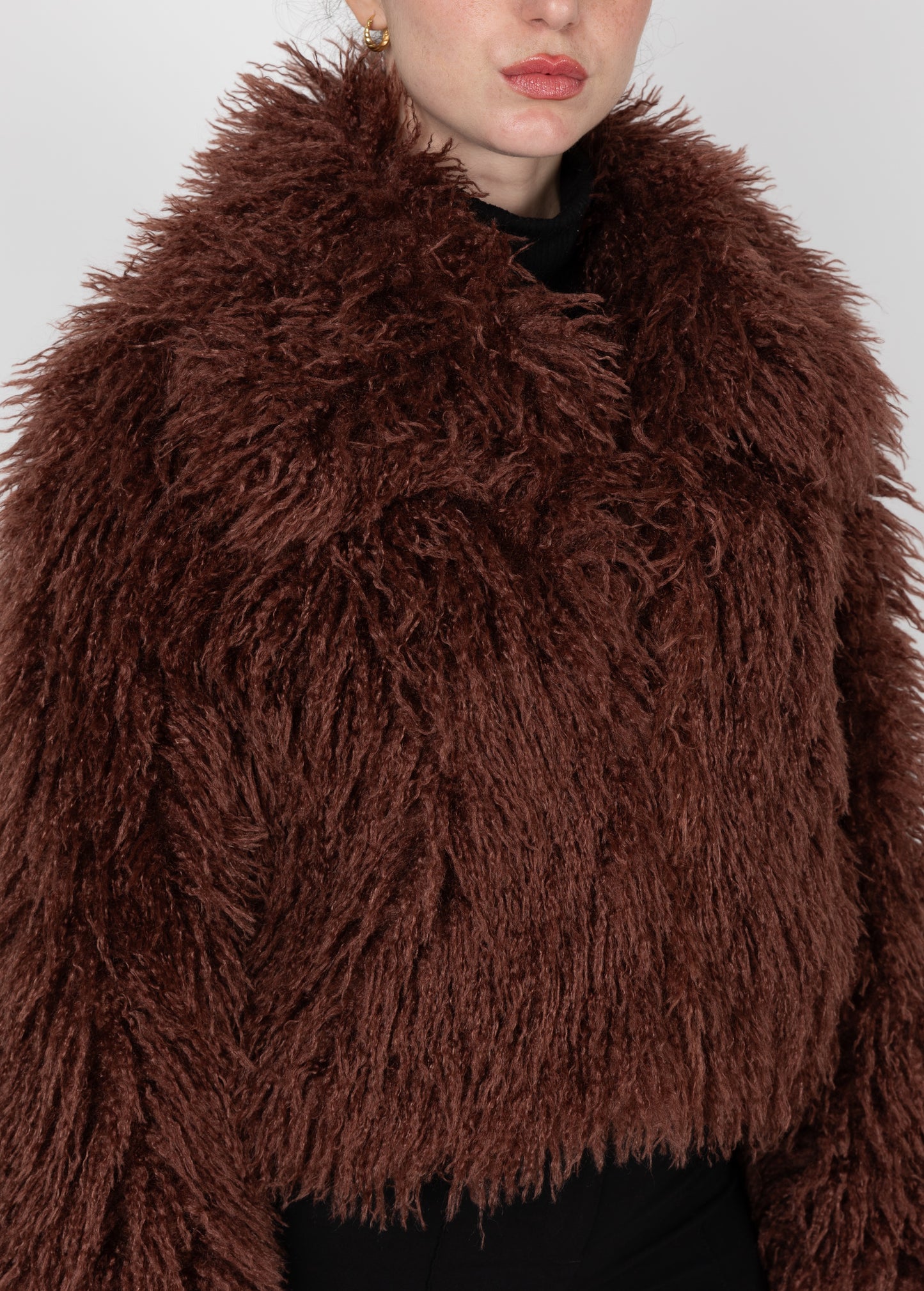 MANTEAU COURT EN FAUSSE FOURRURE MOUTON