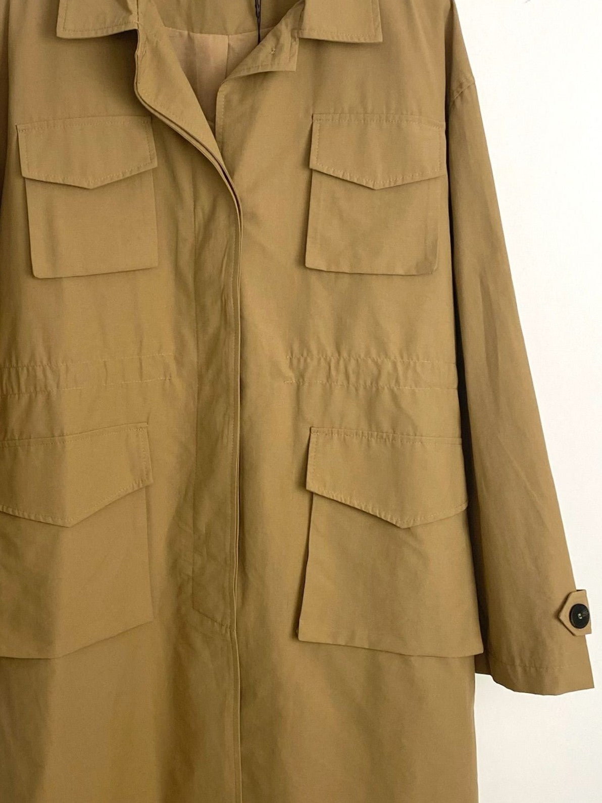 Mid-length belted parka with pockets