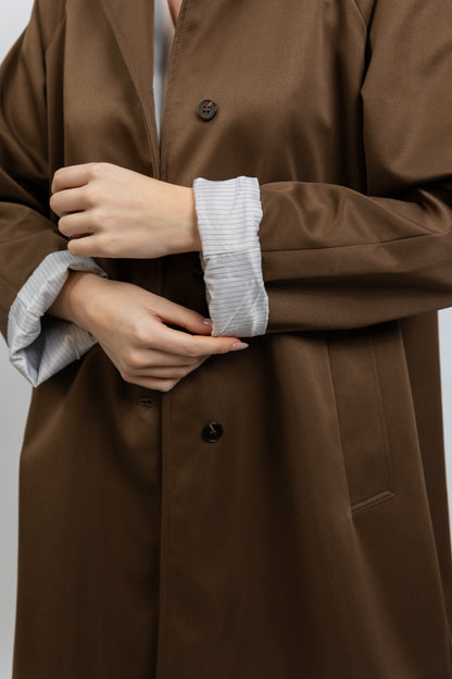 Trench coat with striped lining