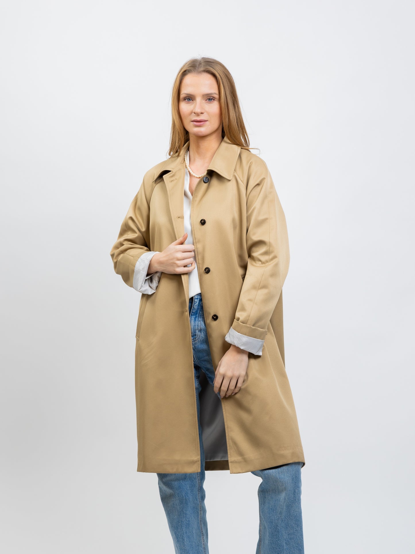 Trench coat with striped lining