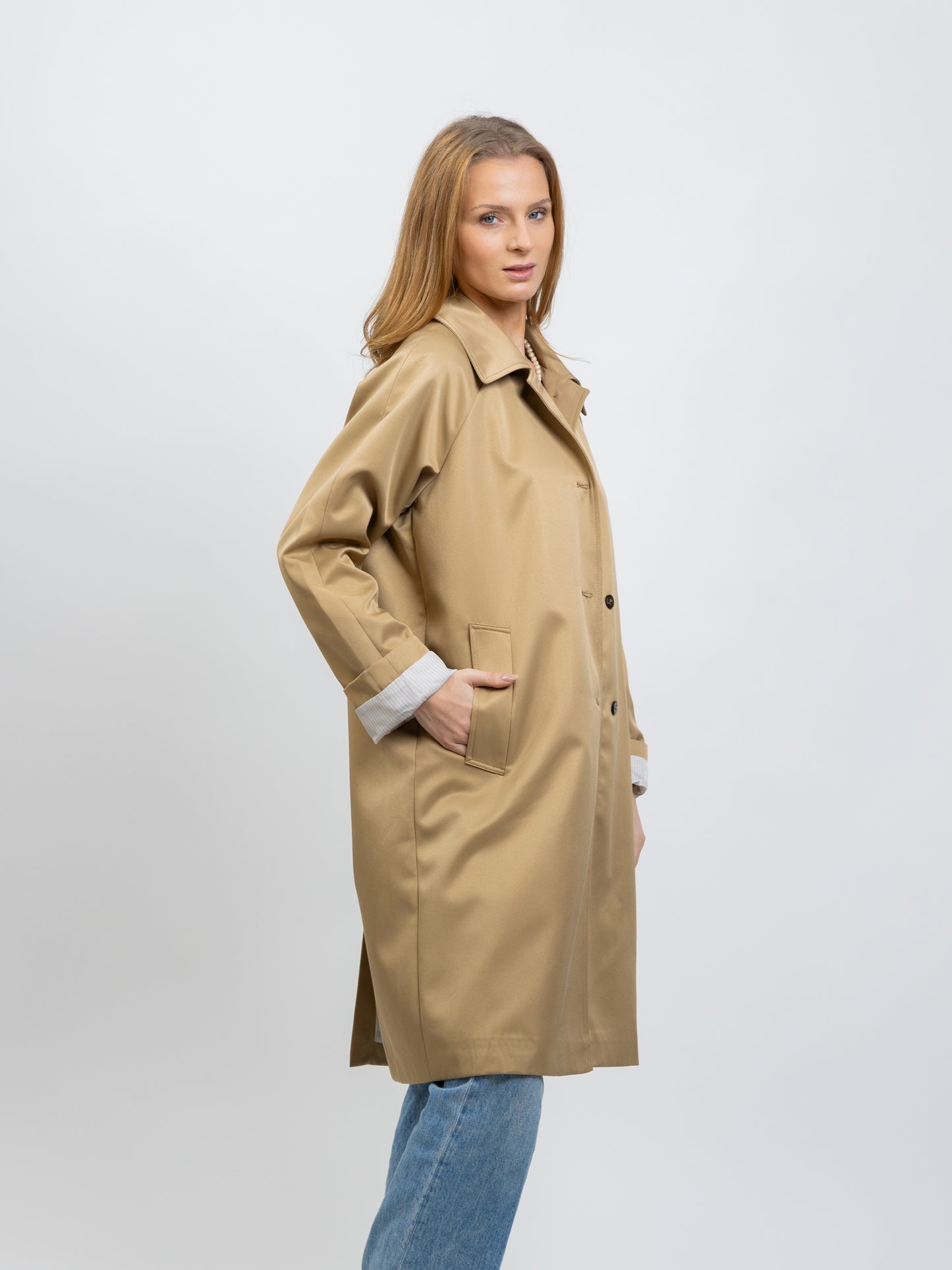 Trench coat with striped lining