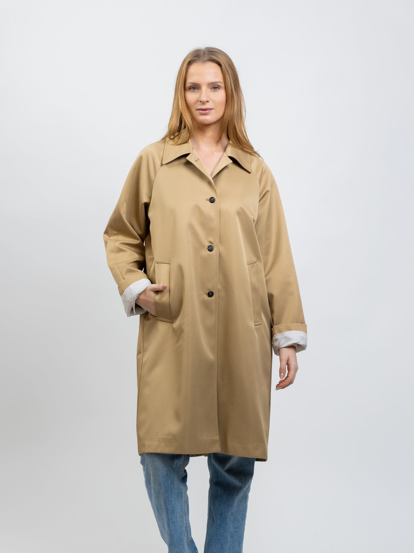 Trench coat with striped lining
