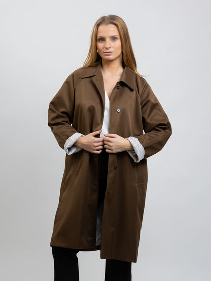 Trench coat with striped lining